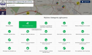 Otworzona strona internetowa KMZB, widać w tle mapę Zduńskiej Woli. Otwarta jest zakładka, w której są ustawione w rzędzie zakładki tematyczne z napisem: wybierz kategorię zagrożenia. Poniżej są w rzędach okienka z napisami: akty wandalizmu, dzikie wysypiska śmieci, nielegalna wycinka drzew oraz inne.