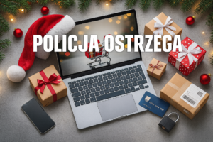 Na stole lezy laptop, pudełka z prezentami, ozdoby świąteczne. Napis: Policja ostrzega.