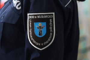 Emblemat z napisem: Liceum Ogólnokształcące o charakterze policyjnym.